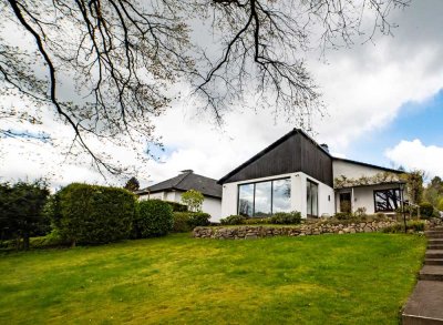 Bungalow auf traumhaften Hanggrundstück im Herzen von Sottorf dem schönsten Dorf im Rosengarten