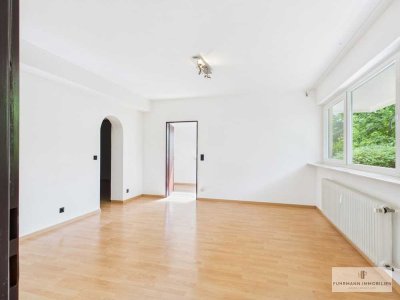 Attraktive Souterrainwohnung mit zwei Schlafzimmern, Wohnbereich und Garagenstellplatz