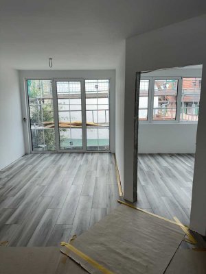 Zentrale Neubauwohnung mit großzügigem Balkon und innovativer Energielösung in Groß-Gerau