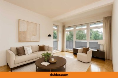 Lichtdurchflutetes Penthouse mit umlaufender Terrasse und Weitblick ins Grüne