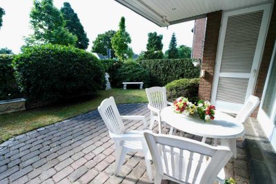 Traumhafte 122 m² Erdgeschosswohnung mit großzügigem Garten, Terrasse und TG Platz in Büderich