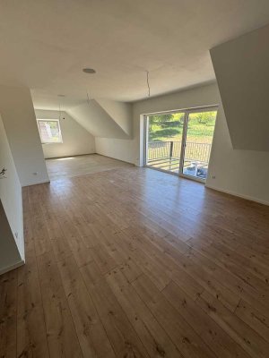 Erstbezug! Hochwertige 3-Zimmer-Dachgeschosswohnung