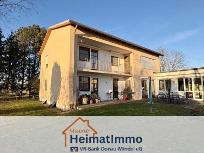 Einfamilienhaus mit großzügiger Gewerbeeinheit zur vielseitigen Nutzung!