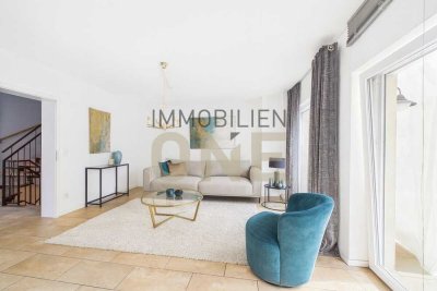 Moderne Doppelhaushälfte mit zwei Terrassen und Garten – Familientraum mit Burgblick