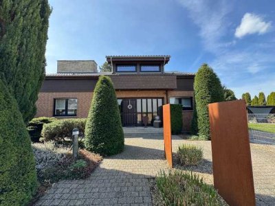 ***ERK-Hetzerath, Traumwohnung mit Garten in exponierter Lage am Feldrain!***