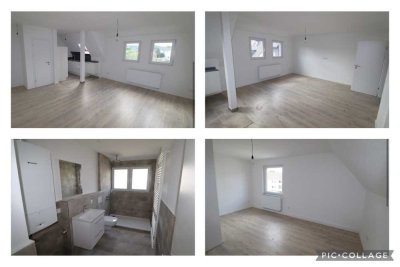 Sanierte ca. 85 qm Dachgeschoss-Wohnung mit Einbauküche & Stellplatz