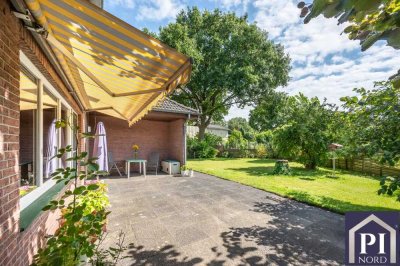 Wohnen auf einer Ebene - Winkelbungalow mit Garage und Doppelcarport