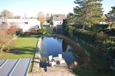 AUSBAUFÄHIGES EINFAMILIENHAUS mit Schwimmteich und großem Grundstück - kaum Energiekosten!