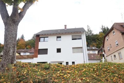 EG-Wohnung mit Garage in energetisch aufgewertetem Mehrfamilienhaus