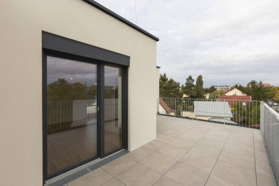 Dachgeschoss-Wohnung mit Klimaanlage und großzügigen Freiflächen, Einbauküche inklusive!