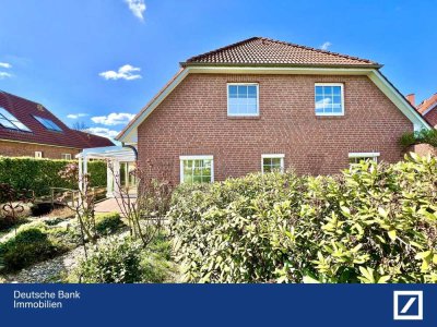 Traumhafte Erdgeschosswohnung mit Wintergarten, großem Garten und Teichanlage
