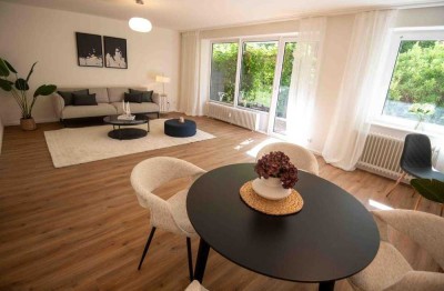 *Besichtigungsstopp* -Modernisierte, 2-3 Zi. EG-Whg. mit bezaubernder Terrasse und TG-Stellplatz