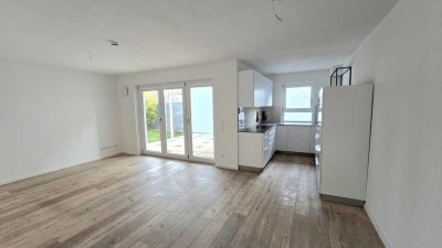 Moderne Gartenwohnung mit Souterrain und lichtvollem Wintergarten