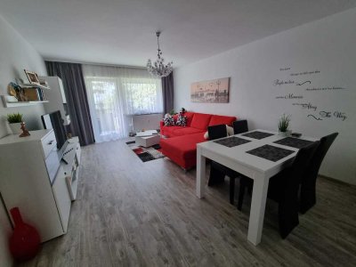 Erstbezug nach Sanierung mit Balkon, Parkplatz: Stilvolle 3-Zimmer-Wohnung mit geh. Innenausstattung
