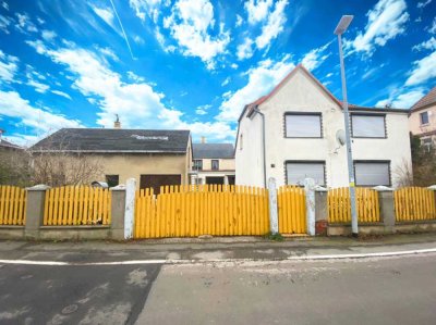 Einfamilienhaus mit separatem Haus und großem Nebengelass in Großdalzig / Zwenkau zu verkaufen