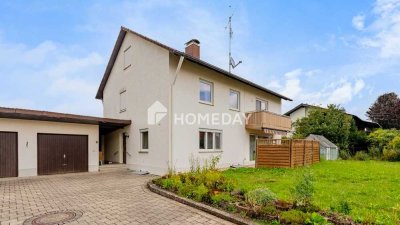 Familienfreundliches EFH mit großzügiger Südost-Terrasse, Garten und zwei Garagen