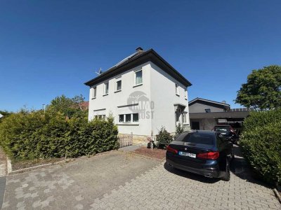 Wohnen mit Stil: Einfamilienhaus mit Kamin, Garten & Terrasse