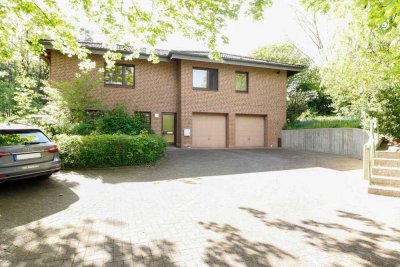 Familienfreundliche Residenz mit Einliegerwohnung als Wohn-/Gewerbemix