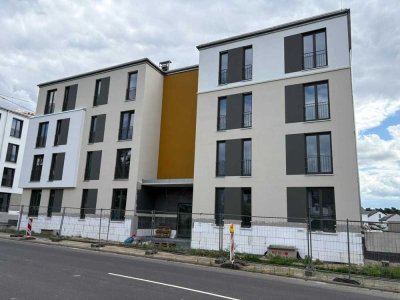 Erstbezug: 2-Zimmer-Neubau mit Einbauküche & E-Stellplatz
