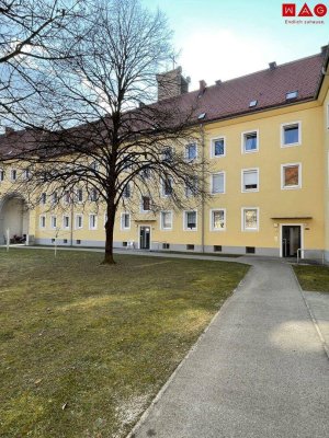 Einladendes Wohnambiente und praktische Raumaufteilung: gemütliche 2-Zimmer-Wohnung mit Grünblick bietet die perfekte Kombination aus naturnahem Wohnen und ausgezeichneter Infrastruktur in Stadtnähe!