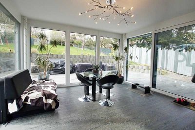 Traumhafte 4 Zimmerwohnung mit großer Terrasse + Garten + Einzelgarage + Stellplatz