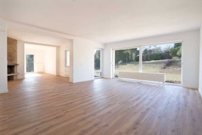 Sonnige Wohnung mit Einfamilienhaus-Flair und Garten