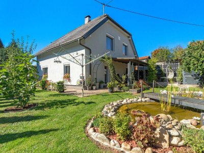 Familienhaus mit Garten, Biotop &amp; zwei Wohneinheiten in Villach