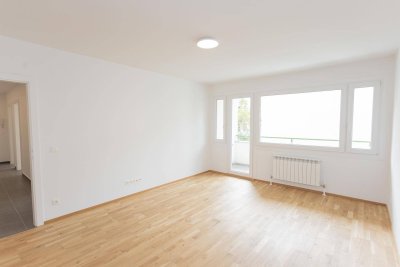 Erstbezug nach moderner Komplettsanierung – helle 4-Zimmer-Eigentumswohnung mit Loggia in ruhiger Penzinger Lage – provisionsfrei!