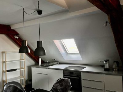 Freundliche 1-Zimmer-DG-Wohnung in Worms mit Einbauküche