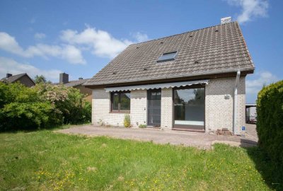 Siedlungshaus mit viel Potenzial in Feldrandlage