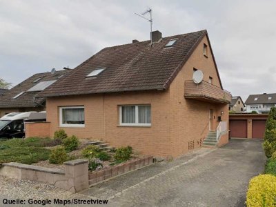 Vielseitiges Ein- bis Zweifamilienhaus mit Garagen in ruhiger Lage von Bad Salzuflen-Holzhausen