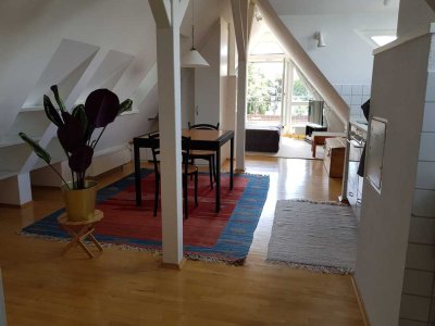 Möblierte Dachgeschosswohnung mit Seeblick in Kressbronn