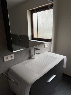 Traumhafte Erdgeschosswohnung mit Kachelofen und Wintergarten