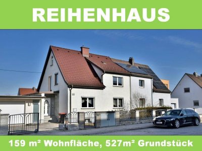 Nettes Reihenhaus mit großem Wintergarten und Garage