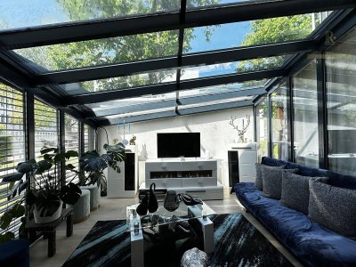 Großzügige Erdgeschosswohnung mit Wintergarten und herrlicher Terrasse