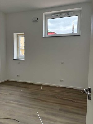 Moderne 3-Zimmer Wohnung mit Terrasse und kleinem Garten