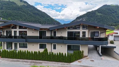 Exklusives Wohnen in Ruhelage – Neubau mit nur vier Wohneinheiten in Kössen, Top 2 im Erdgeschoss