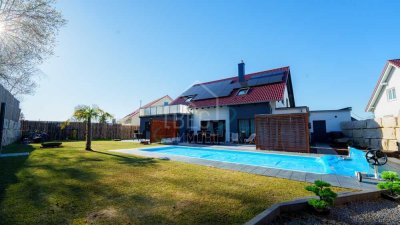 Eleganz trifft Effizienz - Ihre Wellness-Oase im KfW 55 Traumhaus mit Einliegerwohnung