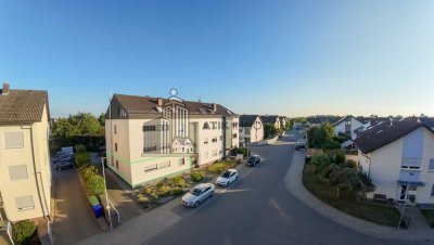 ATIK: Charmante 4-Zimmer-Erdgeschosswohnung mit sonnigem Südbalkon in ruhiger Feldrandlage