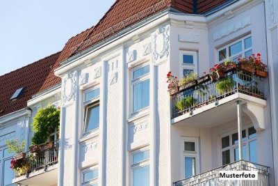 4-Zimmer-Wohnung mit Balkon und Gartenanteil