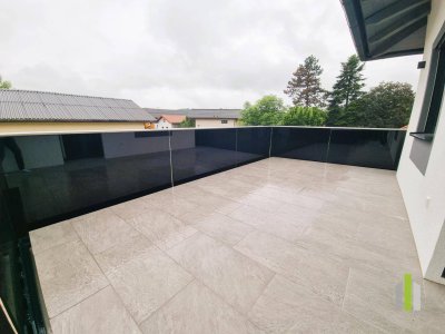 Exklusive 2-Zimmer-Wohnung mit sonniger Süd/West-Terrasse in Jeging
