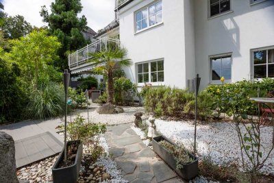 Drei-Zimmer-Wohnung mit großem Garten und zwei TG-Stellplätzen inklusive am Mumm´schen Park