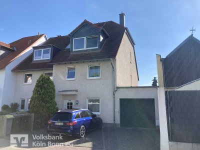 Alfter - Voll vermietetes 3-Parteienhaus mit Garage und PKW-Stellplätzen als solide Kapitalanlage