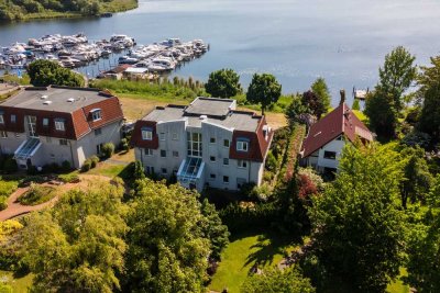 Traumwohnung! Wassergrundstück, Terrasse zum Wasser, vermietete 2-Zi. Wohnung zu verkaufen