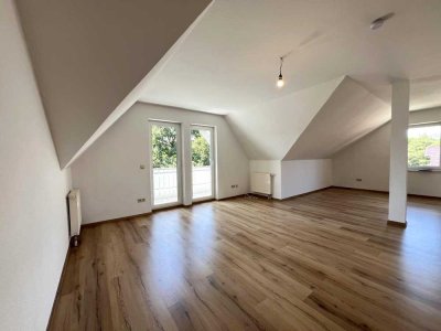Großzügige Dachgeschosswohnung mit Blick ins Grüne! - ruhige und sonnige Lage