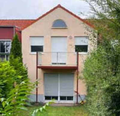 1-Zimmer Dachgeschoss Wohnung mit einer Raumhöhe von bis zu 4m mit Balkon und Tiefgaragenstellplatz