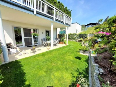 Miete. Neuwertige Wohnung mit Terrasse und Garten in Seeboden. Tiefgarage.