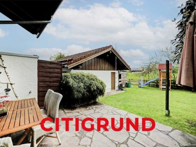 Bruckmühl - Helle 5-Zimmer-Wohnung mit individuellem Haus-im-Haus Charakter und sonnigem Garten