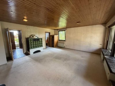 Wohlfühloase mit Potenzial: Bungalow mit Wärmepumpe und großem Garten