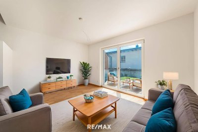 Sonnenverwöhnte Neubauwohnung mit Gartenidylle und Bergblick